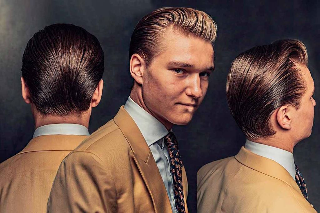 Man with low-density hair styled in a slick back hairstyle showing how thin hair can still achieve a sleek, polished look