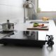Duxtop 1800W portable induction cooktop on a small apartment counter