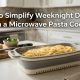 Steaming spaghetti inside a microwave pasta cooker on a bright kitchen counter.